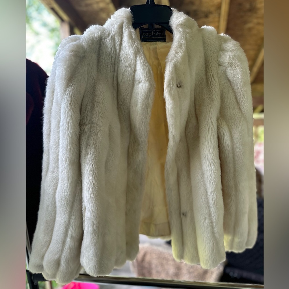 Cream colored Captivity fur coat